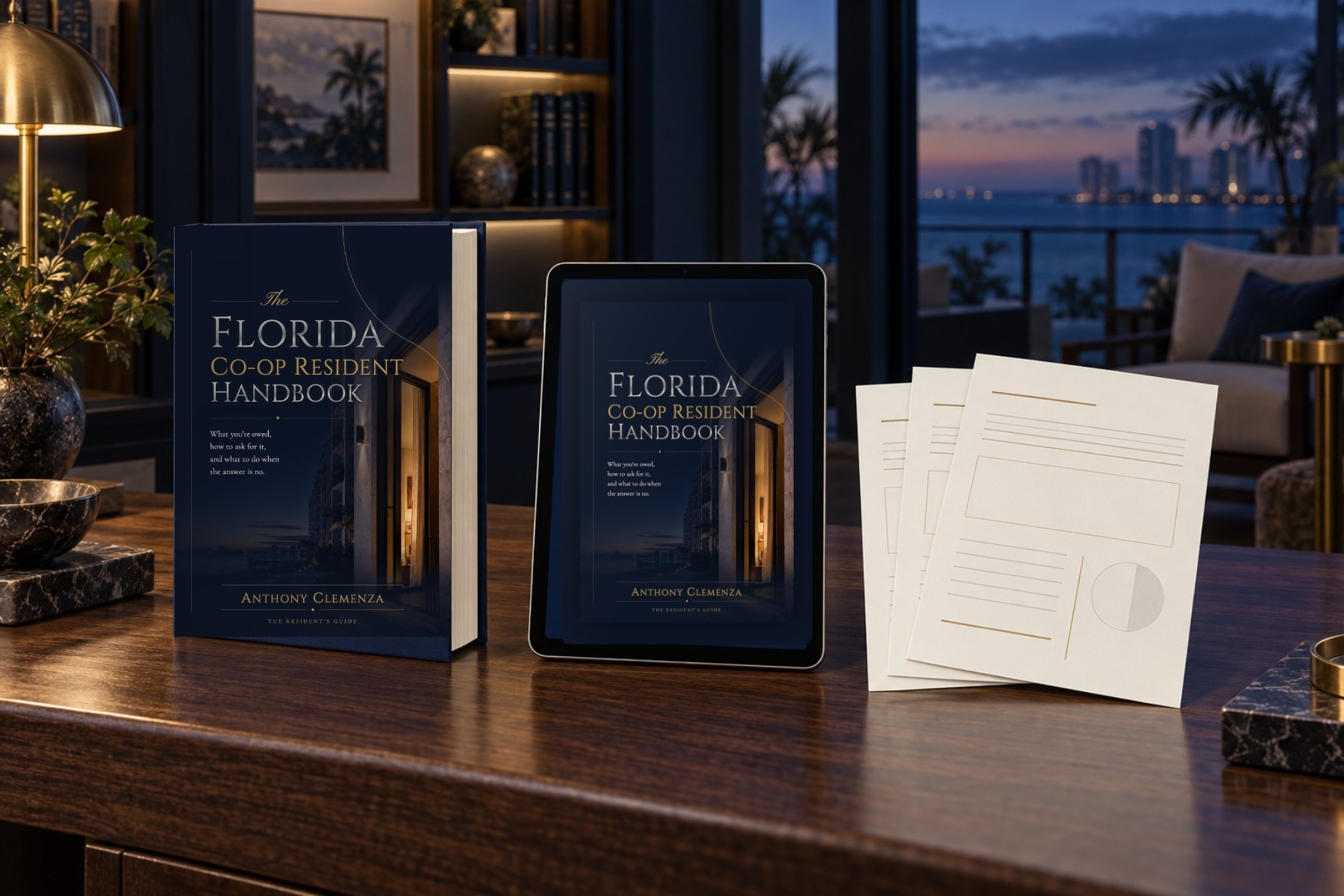 The Resident Reference Set with its hardcover, Digital Edition on a tablet, and abstract forms